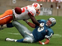 Tampa Bay Bucs PIM 002  Tampa Bay Bucs ERIC CURRY sacks Detroit Lions'  SCOTT MITCHELL during an NFL regular season game. - PhotosinMotion.net. : Tampa Bay Bucs ERIC CURRY sacks Detroit Lions'  SCOTT MITCHELL photo, Tampa Bay Bucs pictures, Buccaneer football photos, NFL pictures, Sports photographer Tampa, Sports photographer, PhotosinMotion.net